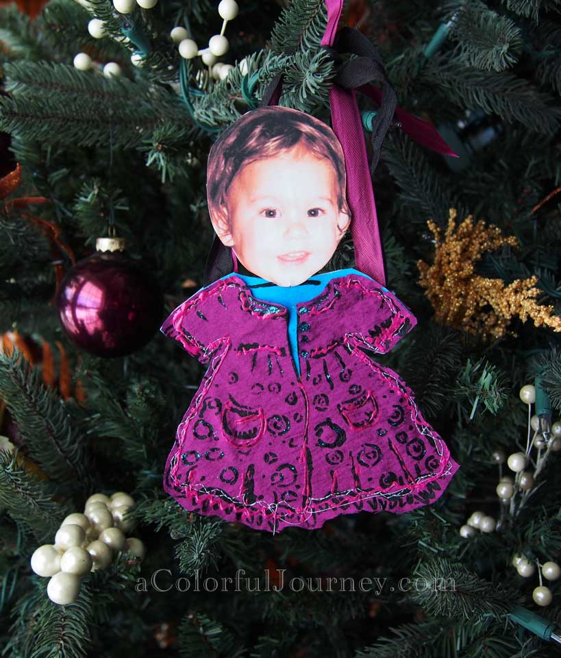 Video tutorial showing how to use a stencil, fabric, and a Gelli print to make an ornament by Carolyn Dube