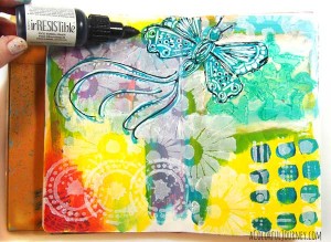 Check out the step by step layers of stenciling building up on this art journal page with a pico embellisher!
