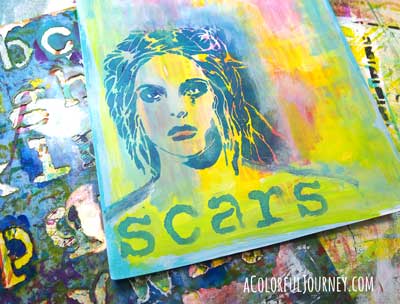 Step by step art journaling a stenciled face with a big Oops with a BIG message