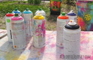 Spray painting a trash can with chalk paint and stencils with Carolyn Dube