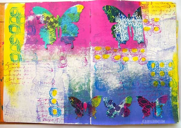 I made a messy paper with stencils then used them with a die cut to make a butterfly art journal page!