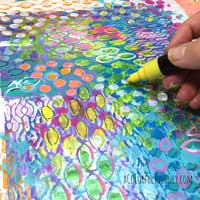 I started  with a Gelli print® and then built up layers of stencils and simple doodling to create a mixed media paper