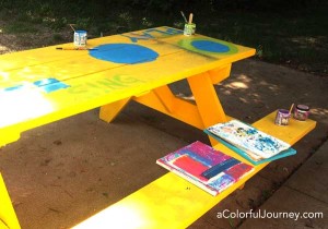 I just couldn't help but paint my picnic table with paint and stencils