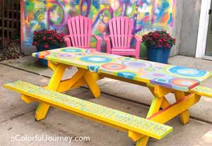 I just couldn’t help but paint my picnic table with paint and stencils