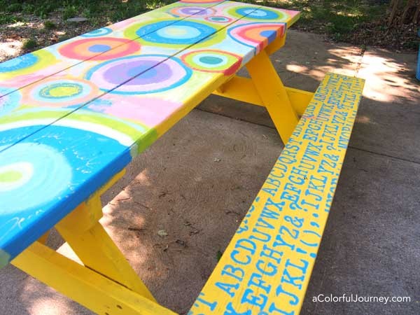 I just couldn't help but paint my picnic table with paint and stencils