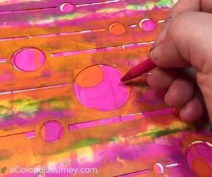 She shows how with just a twist of the stencil, it creates a whole different look in the video - so easy!
