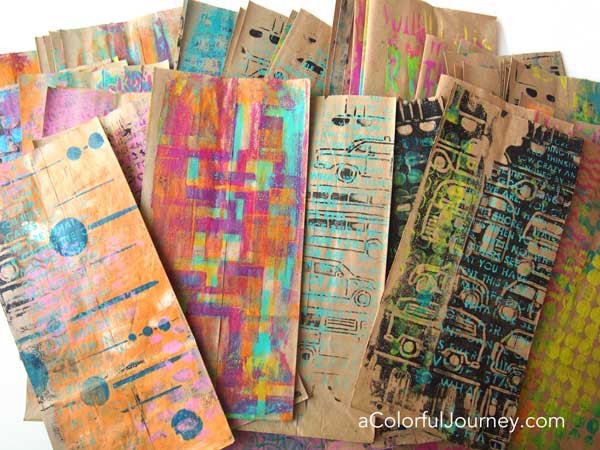 A Gelli Plate® and stencils make plain brown bags colorful goodie bags