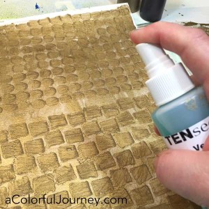 Carolyn plays with VerDay paint and patina to turn paper into old rusted pattern with a stencil in a fun video