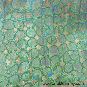 Carolyn plays with VerDay paint and patina to turn paper into old rusted pattern with a stencil in a fun video