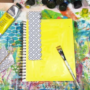 She's got an art journaling video showing how she started with a tissue box!