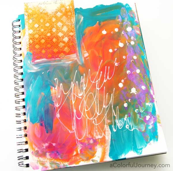 She started this art journal page with a big random mess and the shares it layer by layer!
