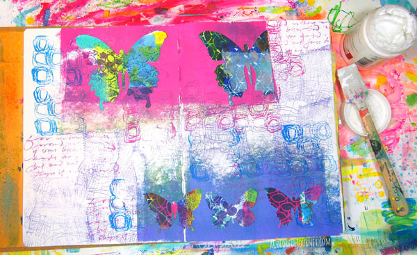 I made a messy paper with stencils then used them with a die cut to make a butterfly art journal page!