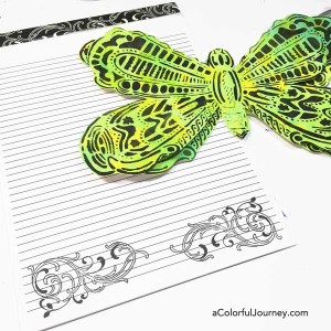 Video creating a fun layered butterfly book for journaling from a stencil