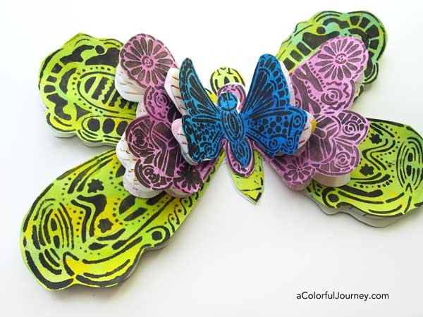Video creating a fun layered butterfly book for journaling from a stencil