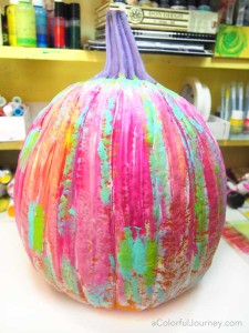 Video showing to art journal a pumpkin for Halloween- bright and happy rainbow colors!