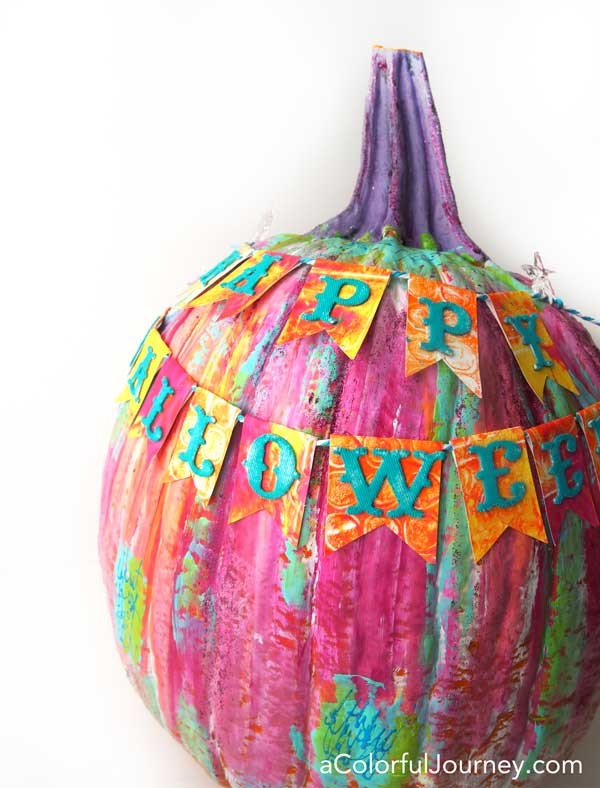 Video showing to art journal a pumpkin for Halloween- bright and happy rainbow colors!