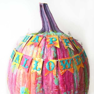 Video showing to art journal a pumpkin for Halloween- bright and happy rainbow colors!