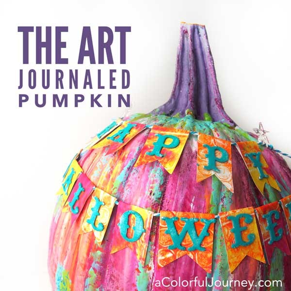 Video showing to art journal a pumpkin for Halloween- bright and happy rainbow colors!