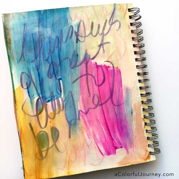 How to take an ugly art journal page and make it better with glitter and a stencil