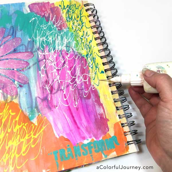 How to take an ugly art journal page and make it better with glitter and a stencil