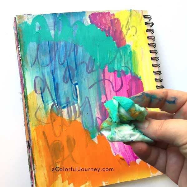 How to take an ugly art journal page and make it better with glitter and a stencil