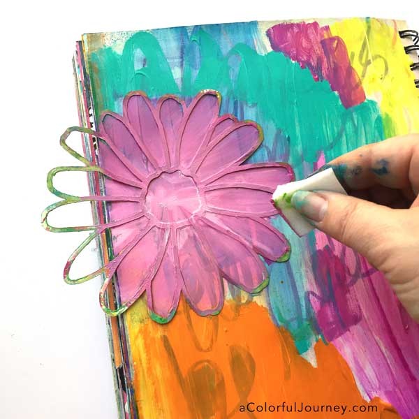How to take an ugly art journal page and make it better with glitter and a stencil