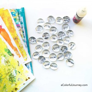 Video showing how to use a stencil to make word pebbles with Gelli printed® papers for the Let's Play link party