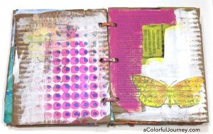 Video tutorial adding layers of color in a cardboard art journal with Carolyn Dube
