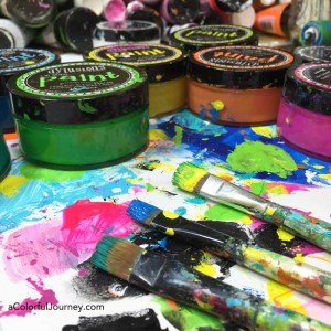 How to use Tim Holtz tissue wrap, a rubber stamp with paint, and stencils in an art journal for this week's Let's Play video!