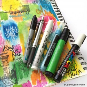 What are distress crayons from TIm Holtz? Video showing how to use them in an art journal and what pens will write on it by Carolyn Dube