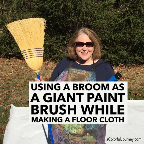 Using A Broom As Giant Paintbrush On A Floor Cloth Carolyn Dube