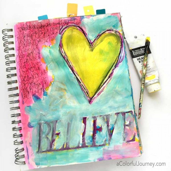 Video sharing how Carolyn took an old art journal page and made it sparkle!