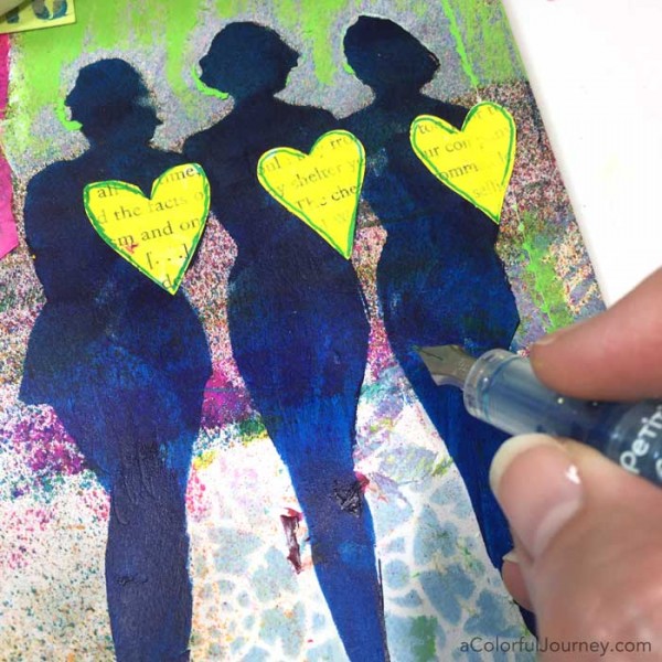 Stenciling the cover of an art journal with silhouettes by Carolyn Dube