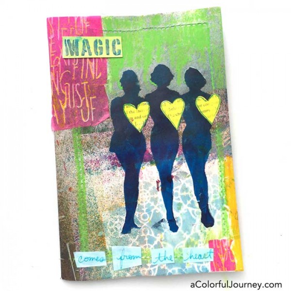 Stenciling the cover of an art journal with silhouettes by Carolyn Dube