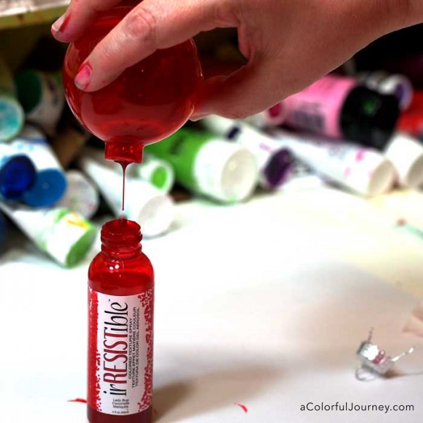 Video tutorial sharing how to get your stenciling inside a glass ornament 