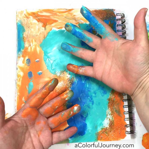 Finding inspiration for play from kids for this Let's Play video all about fingerpainting in an art journal 