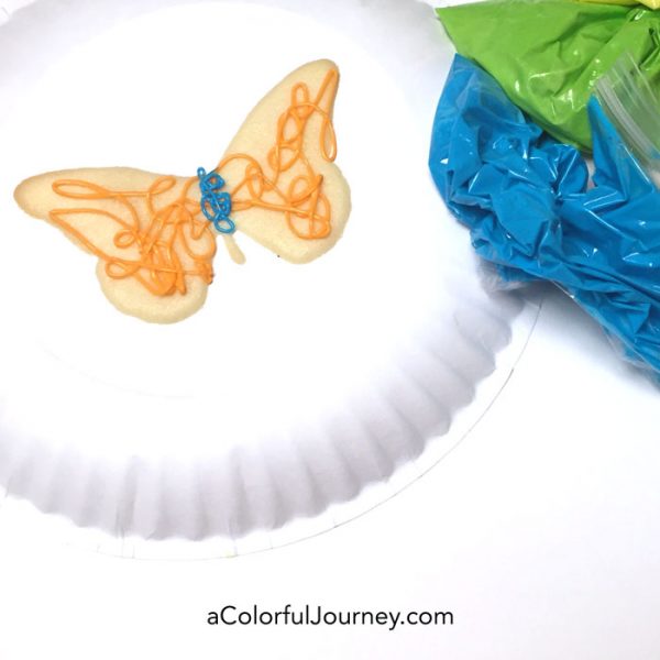 Using a stencil to quickly make butterfly cookies video tutorial