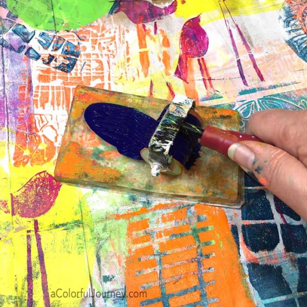 Using a gel plate, stencils, and a paper bag to make a giant piece of colorful paper