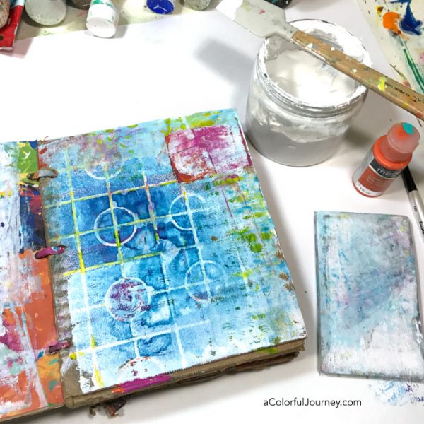 How I dealt with the challenge of dylusions spray ink bleeding in an art journal