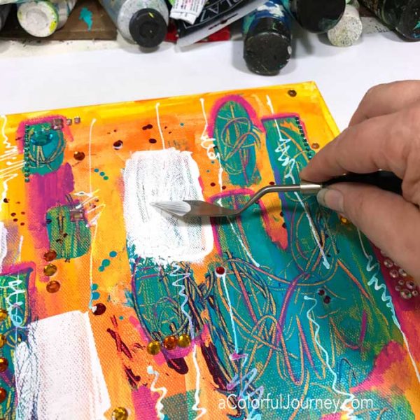 How I bedazzled a mixed media canvas in an attempt to use up gems I had been hoarding