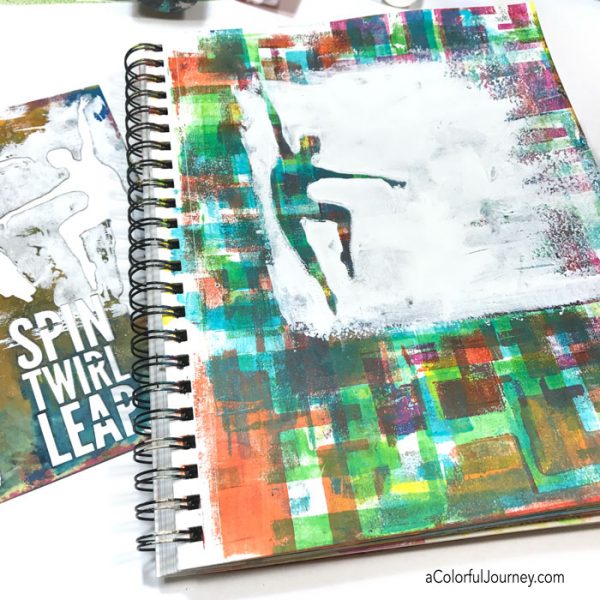 Adding a layer to my art journal with a dancing stencil and I made a huge OOPS but a baby wipe fixed it all!