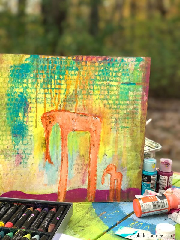 Imaginary creatures appear from paint drips during mixed media play by Carolyn Dube