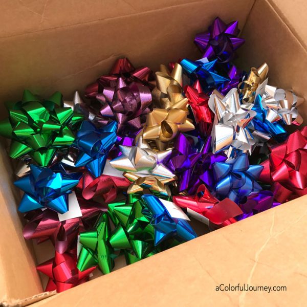 Upcycling leftover holiday bows mixed media style with spray paint tutorial by Carolyn Dube