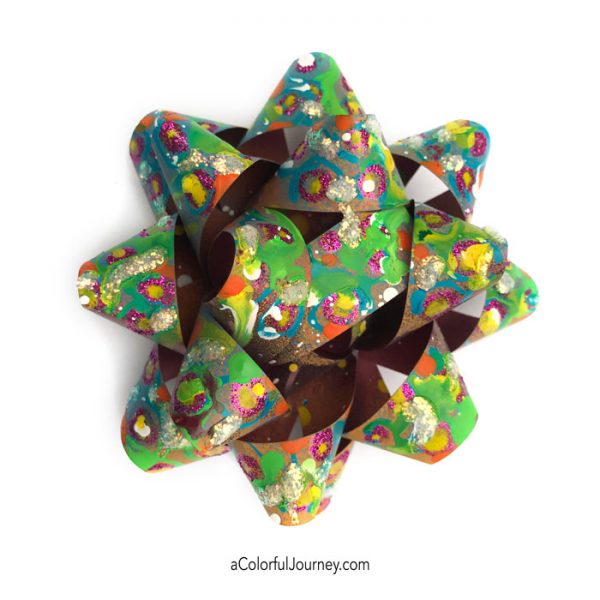 Upcycling leftover holiday bows mixed media style with spray paint tutorial by Carolyn Dube