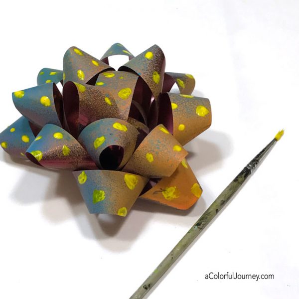 Upcycling leftover holiday bows mixed media style with spray paint tutorial by Carolyn Dube