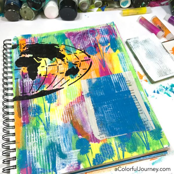 A surprise in my art journal courtesy of a vintage photo...video of the play with StencilGirl stencils, Darkroom Door stamps, gel plate, and more by Carolyn Dube!