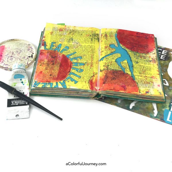 Stenciling with a mask in a gel printed altered book art journal video tutorial by Carolyn Dube